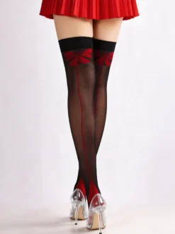Bas cuissardes sexy noirs transparents à nœud rouge