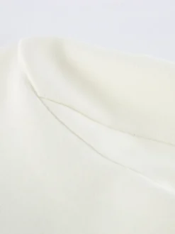 Blazer crème à revers cranté pour femme - Veste oversize à simple boutonnage - Tenue printanière décontractée et minimaliste idéale pour la ville (collection printemps 2026)