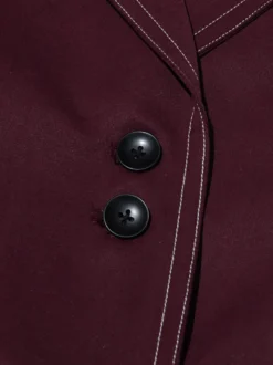 Blazer long à coutures contrastées pour femme revers cranté double boutonnage longueur maxi