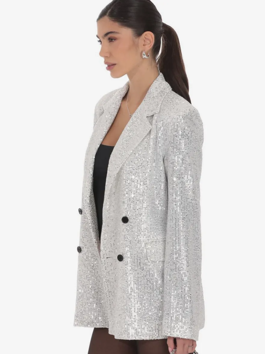 Blazer à sequins croisé pour femme coupe oversize idéal pour les soirées et les clubs noir et argent.