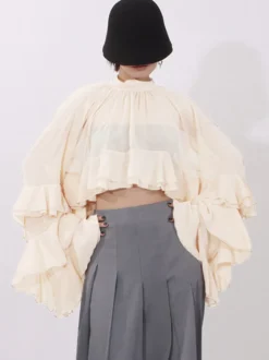 Blouse pour femme couleur saumon à volants plissée col montant manches longues chic