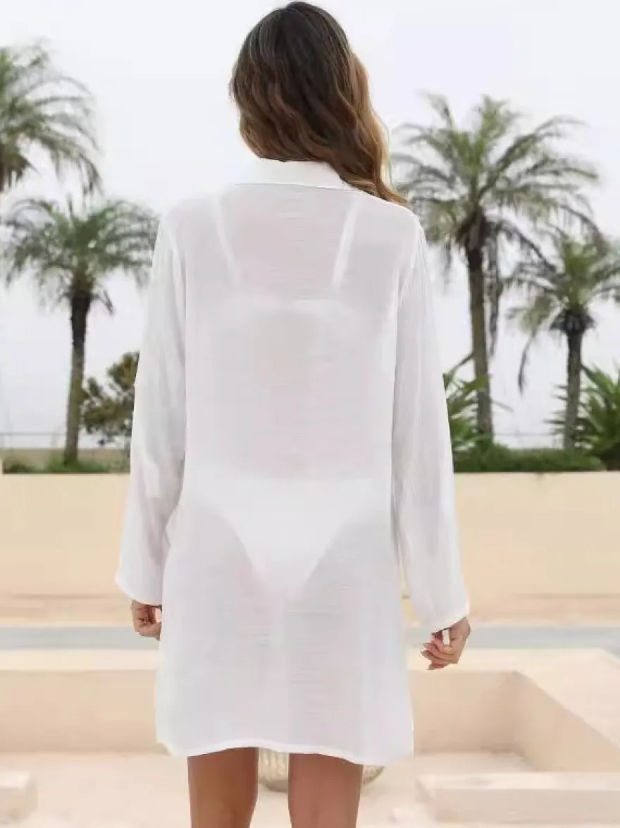 Blouse pour femme en coton blanc col rabattu boutons chics manches longues