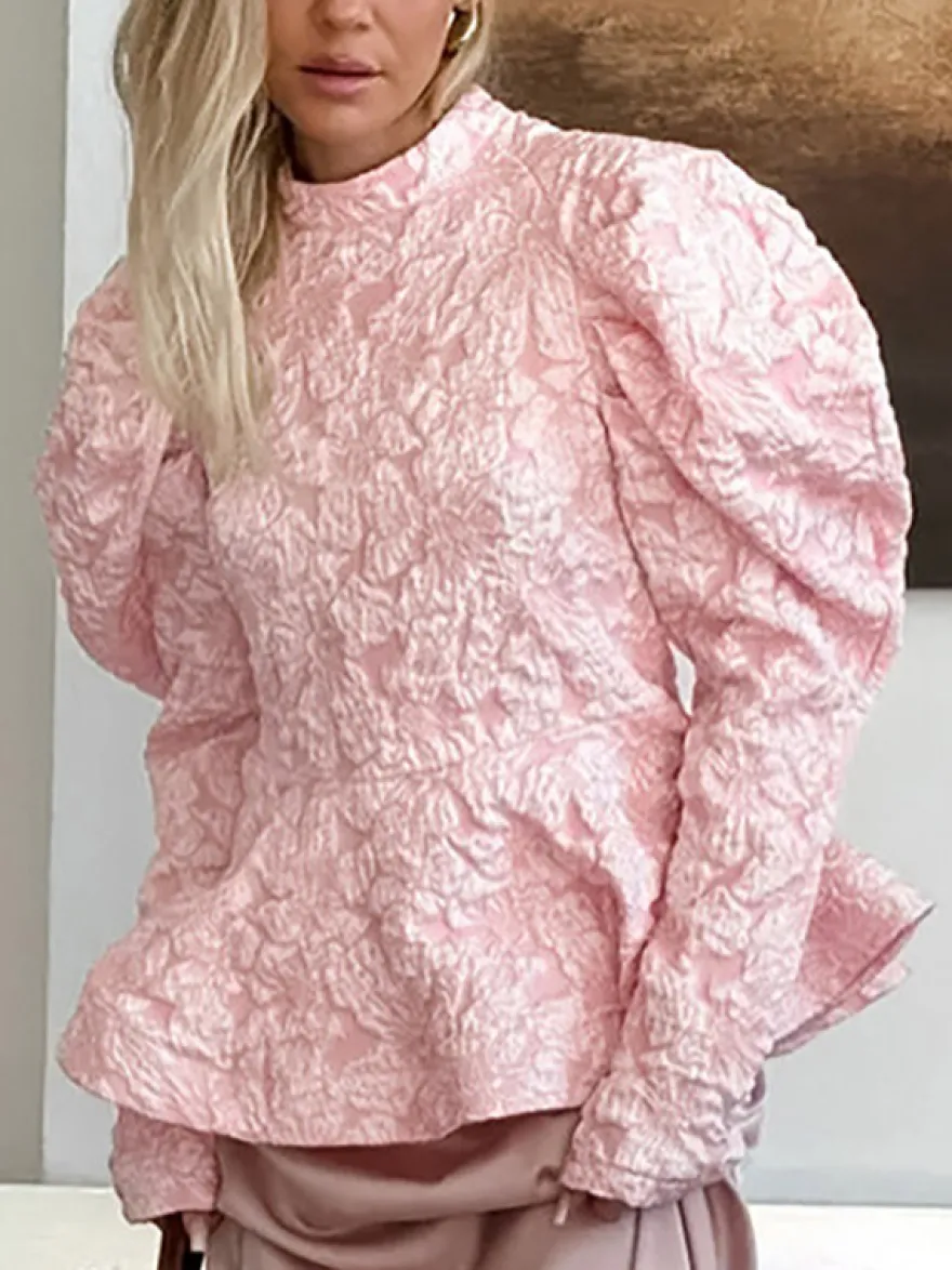 Blouse texturée en jacquard à manches bouffantes col montant taille péplum ourlet évasé