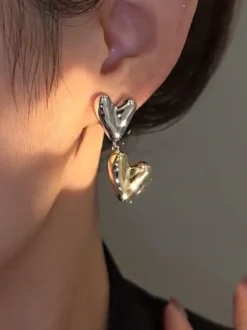 Boucle d'oreille bicolore en forme de cœur pour femme 2026