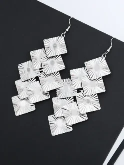 Boucles d'oreilles argentées pour adulte style western décontracté bijoux à motifs.