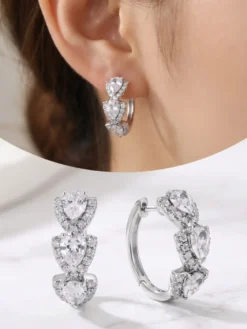 Boucles d'oreilles blanches pour adulte style western décontracté design géométrique en forme de goutte.