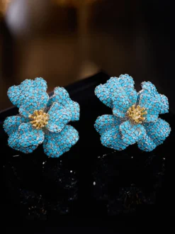Boucles d'oreilles puces en cristal bleu pavé 3D en forme de fleur centre doré style floral affirmé