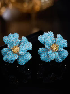 Boucles d'oreilles puces en cristal bleu pavé 3D en forme de fleur centre doré style floral affirmé
