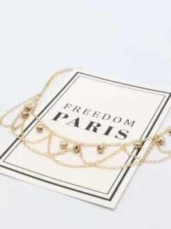 Bracelet de cheville délicat en forme de cloche pour vacances à la plage
