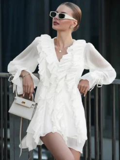 Chemise blanche à volants pour femme col en V manches longues élégantes