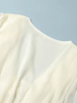 Chemise blanche à volants pour femme col en V manches longues élégantes