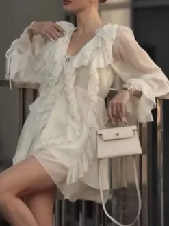 Chemise blanche à volants pour femme col en V manches longues élégantes