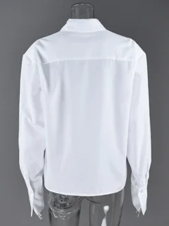 Chemise habillée à manches longues col pointu oversize et poignets larges