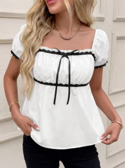 Chemisier péplum à col carré et manches bouffantes noires en dentelle avec nœud papillon pour femme