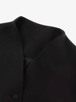 Chemisier péplum à col montant manches bouffantes courtes col rond taille cintrée