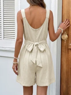 Combinaison de vacances combishort col V bretelles nœud papillon plissée taille haute poches plissées