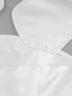 Ensemble deux pièces blanc chic en dentelle jupe sans manches sculptante style décontracté au quotidien.