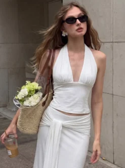 Ensemble deux pièces blanc chic à lacets jupe sans manches à col en V et haut de style streetwear