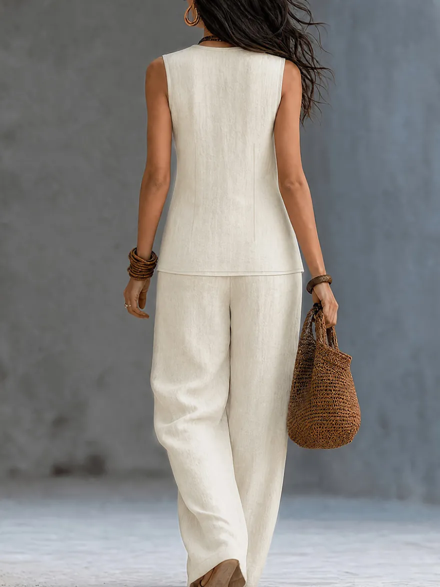 Ensemble deux pièces en lin mélangé pour femme : haut cache-cœur sans manches à col en V et pantalon large.