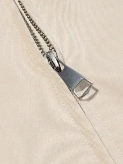 Ensemble 2 pièces : pantalon blanc plissé en polyester col rabattu manches longues.