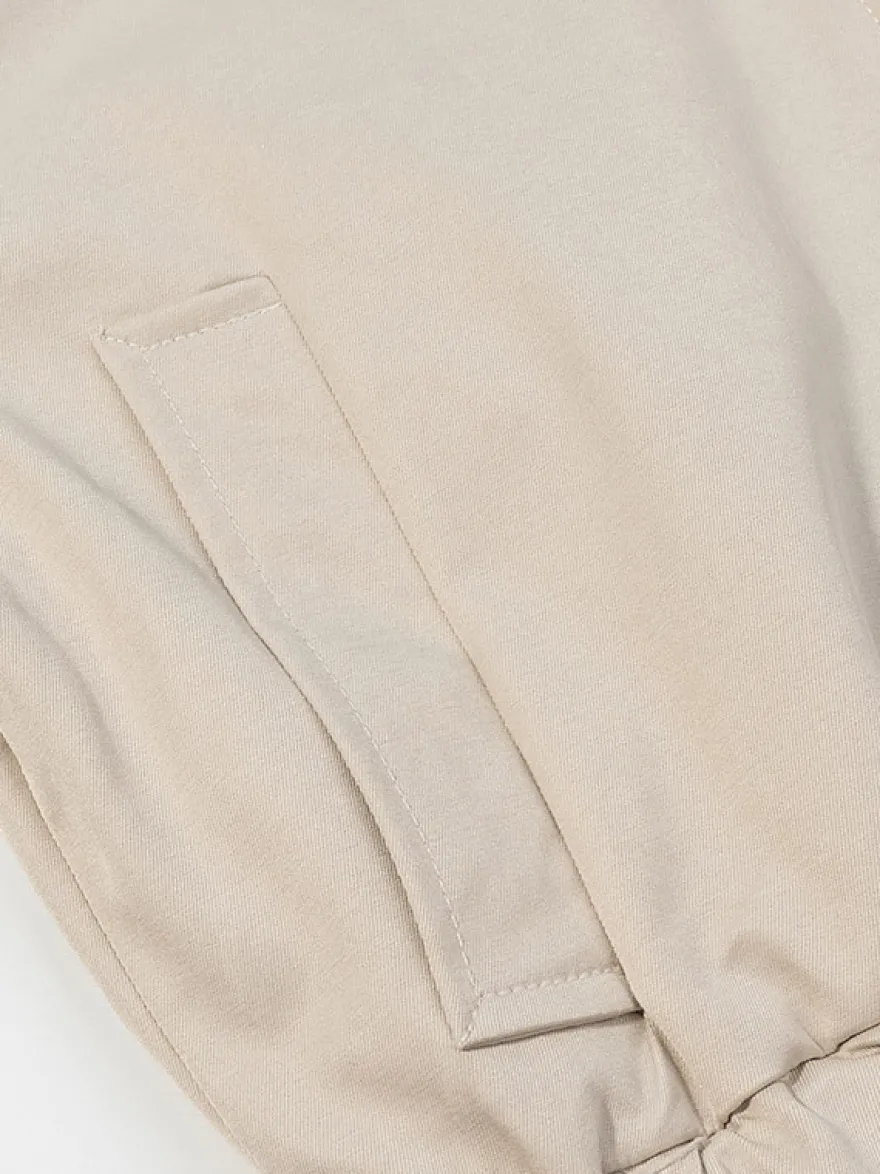 Ensemble 2 pièces : pantalon blanc plissé en polyester col rabattu manches longues.