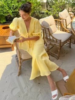 Ensemble 2 pièces pour femme : haut péplum à col en V et manches bouffantes noué sur le devant jupe longue sirène