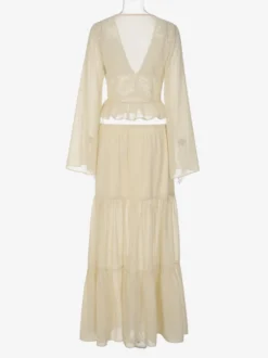 Ensembles deux pièces : jupe robe maxi couleur abricot tenue de villégiature boutons col en V manches longues.