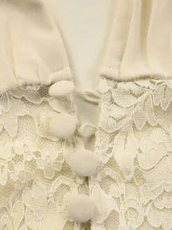 Ensembles deux pièces : jupe robe maxi couleur abricot tenue de villégiature boutons col en V manches longues.