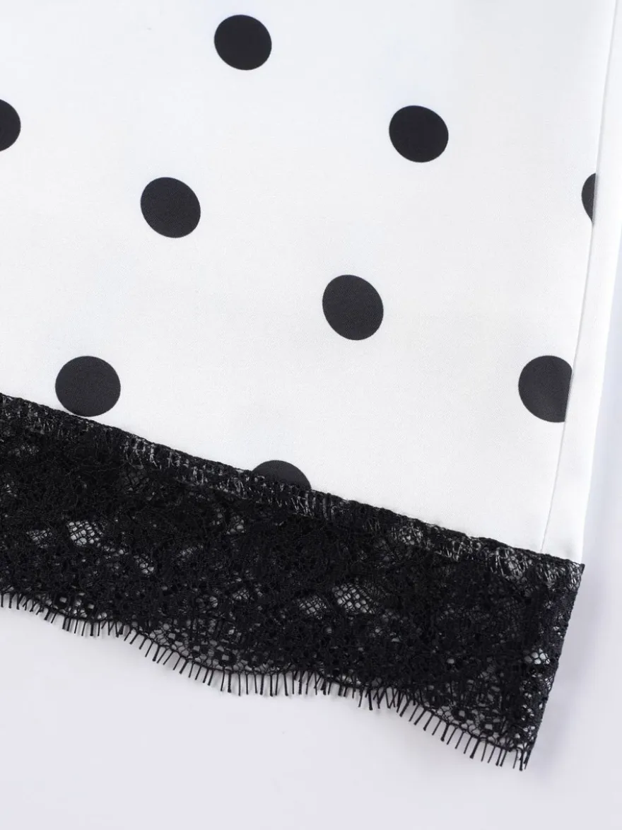 Jupe crayon élégante pour soirée formelle taille haute et coupe ajustée en satin à pois.