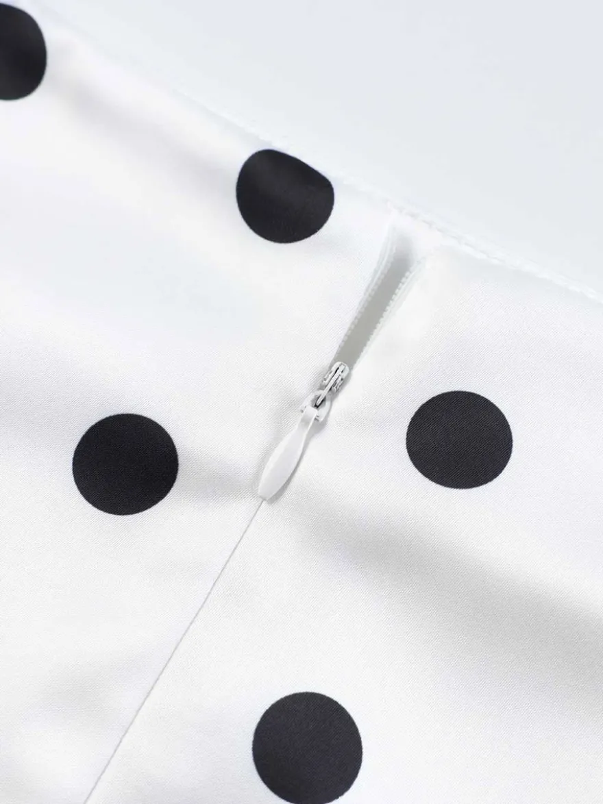 Jupe crayon élégante pour soirée formelle taille haute et coupe ajustée en satin à pois.