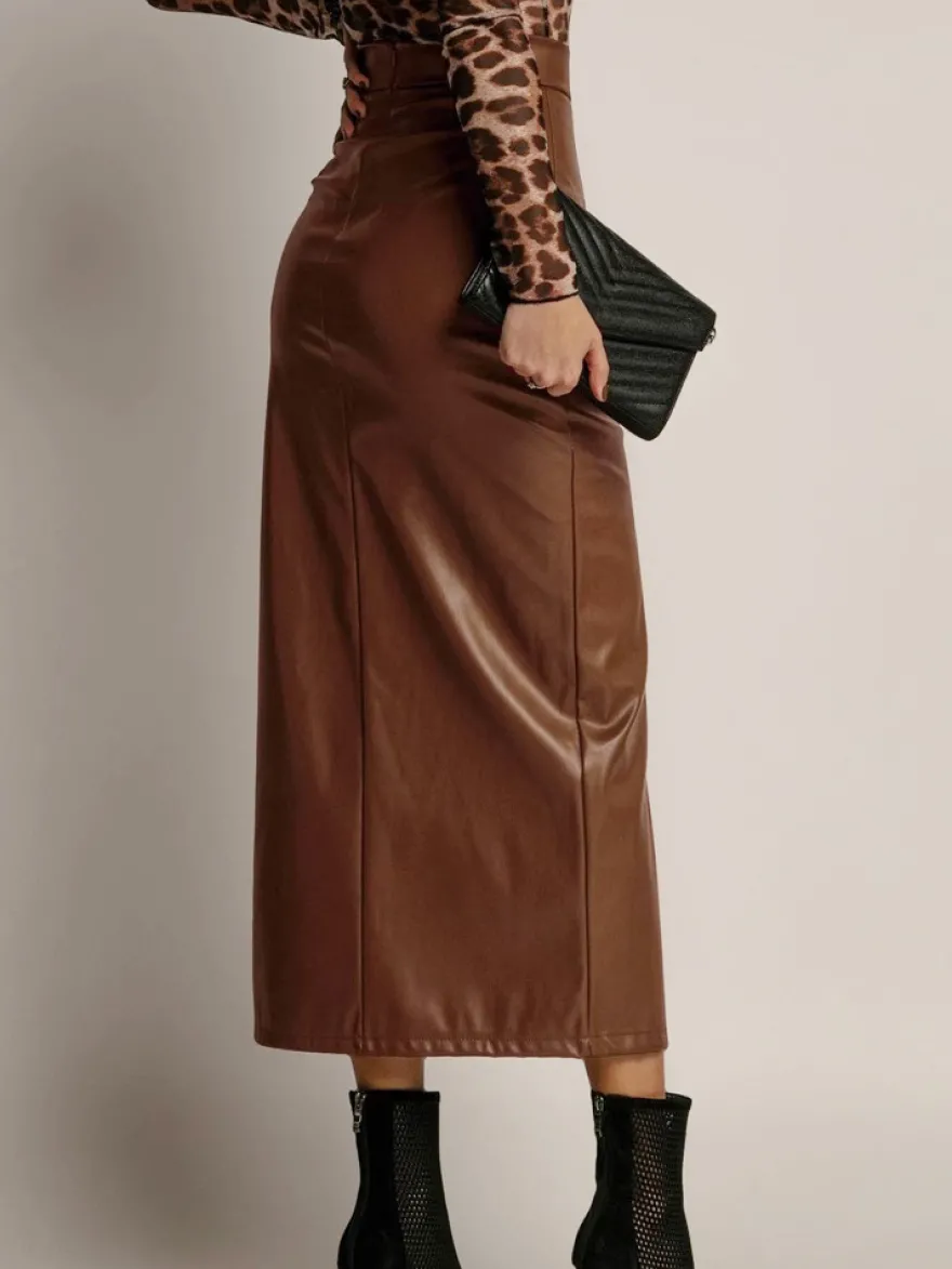 Jupe en similicuir avec fente latérale taille haute couleur unie jupe mi-longue chic en PU pour femme 2026