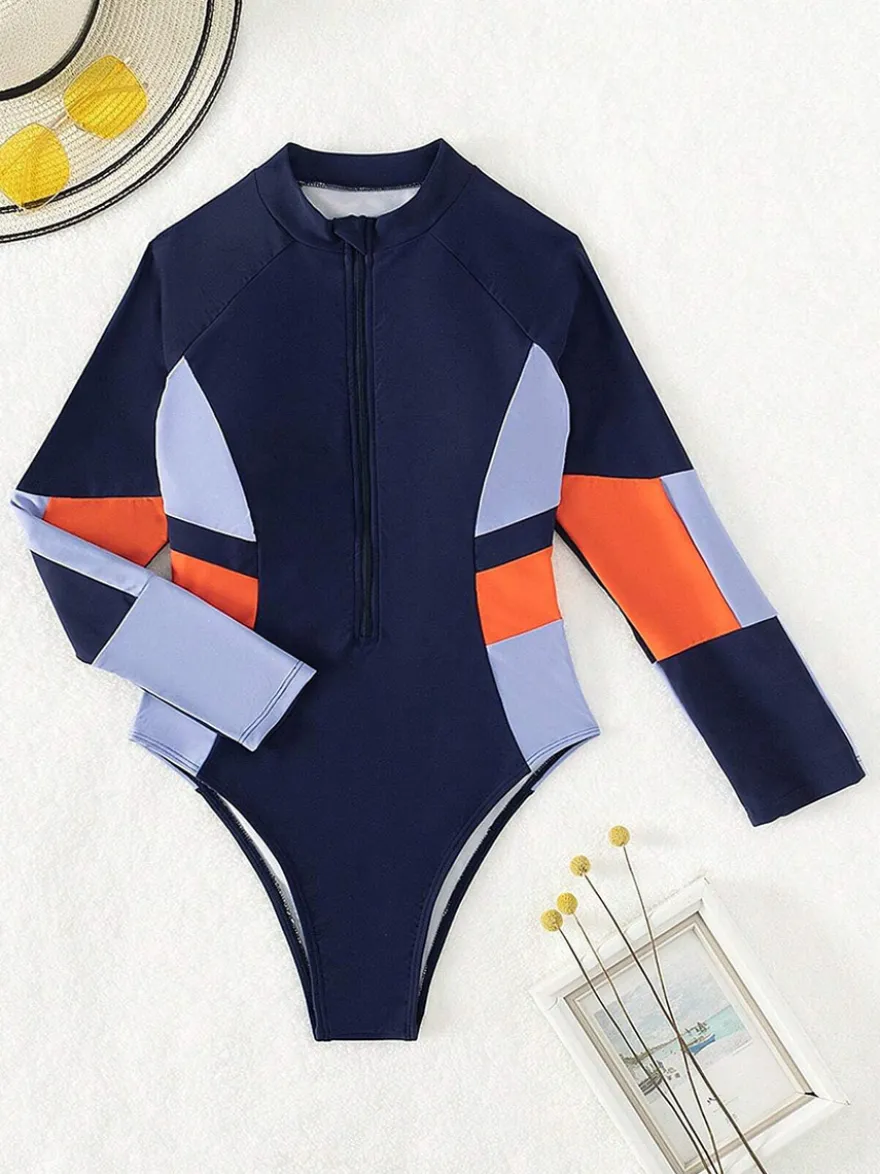 Maillot de bain une pièce de surf à manches longues et fermeture éclair sur le devant empiècements colorés