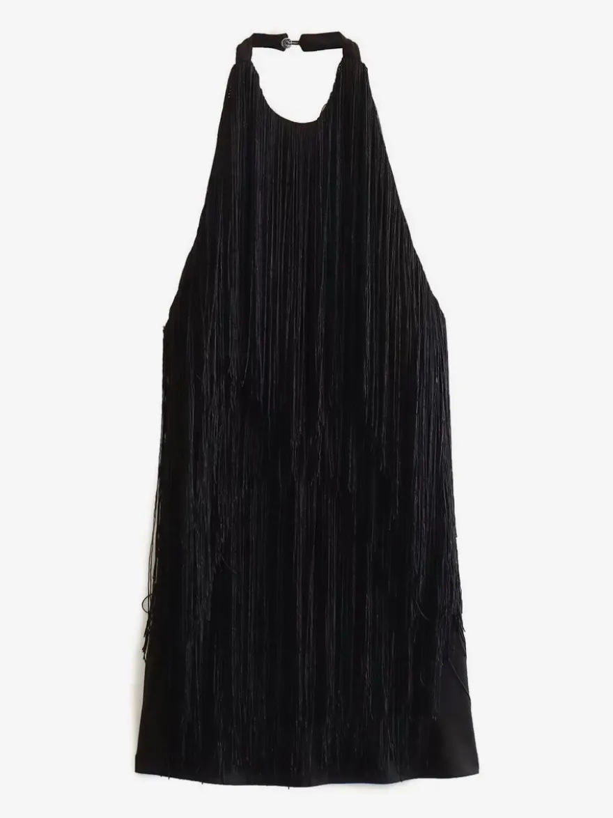 Mini-robe à franges et pompons dos nu et décolleté licou pour soirée 2026