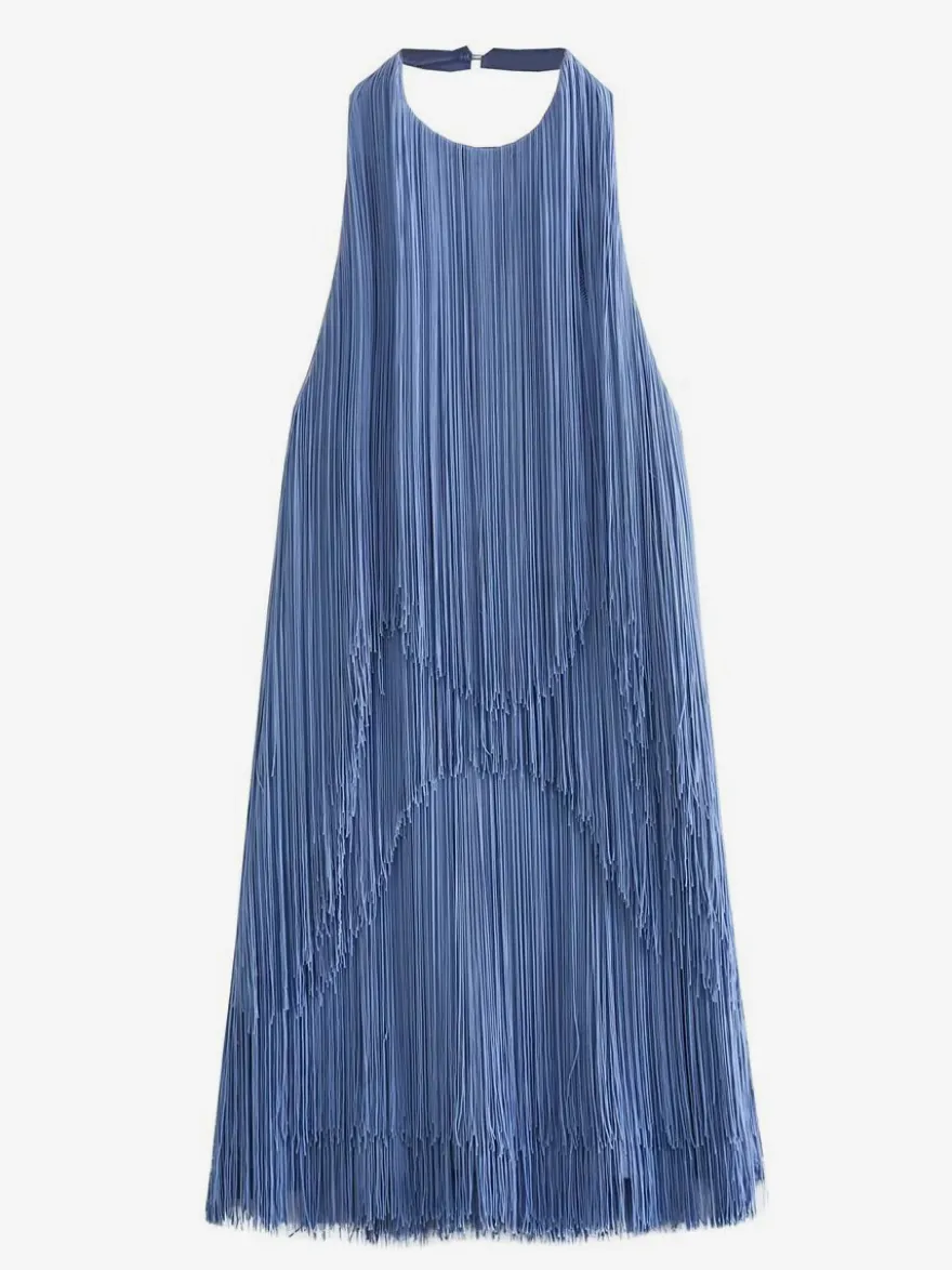 Mini-robe à franges et pompons dos nu et décolleté licou pour soirée 2026