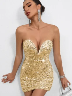 Mini-robe moulante à sequins décolleté en cœur et nœud dans le dos idéale pour les fêtes 2026