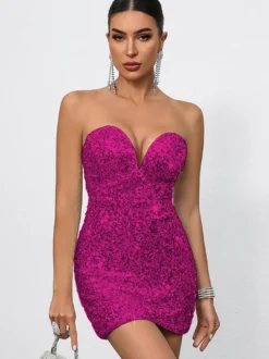 Mini-robe moulante à sequins décolleté en cœur et nœud dans le dos idéale pour les fêtes 2026
