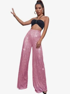 Pantalon palazzo à sequins taille haute et jambes larges style clubwear.