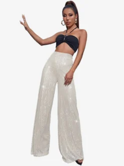 Pantalon palazzo à sequins taille haute et jambes larges style clubwear.