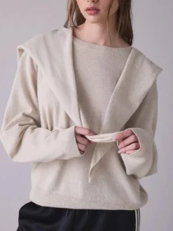 Pull-over ample à manches longues et col rond épaules tombantes rayé uni oversize en maille.