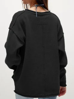 Pull oversize à col bateau manches chauve-souris et manches chauve-souris en maille gaufrée.