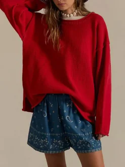 Pull oversize à col bateau manches chauve-souris et manches chauve-souris en maille gaufrée.