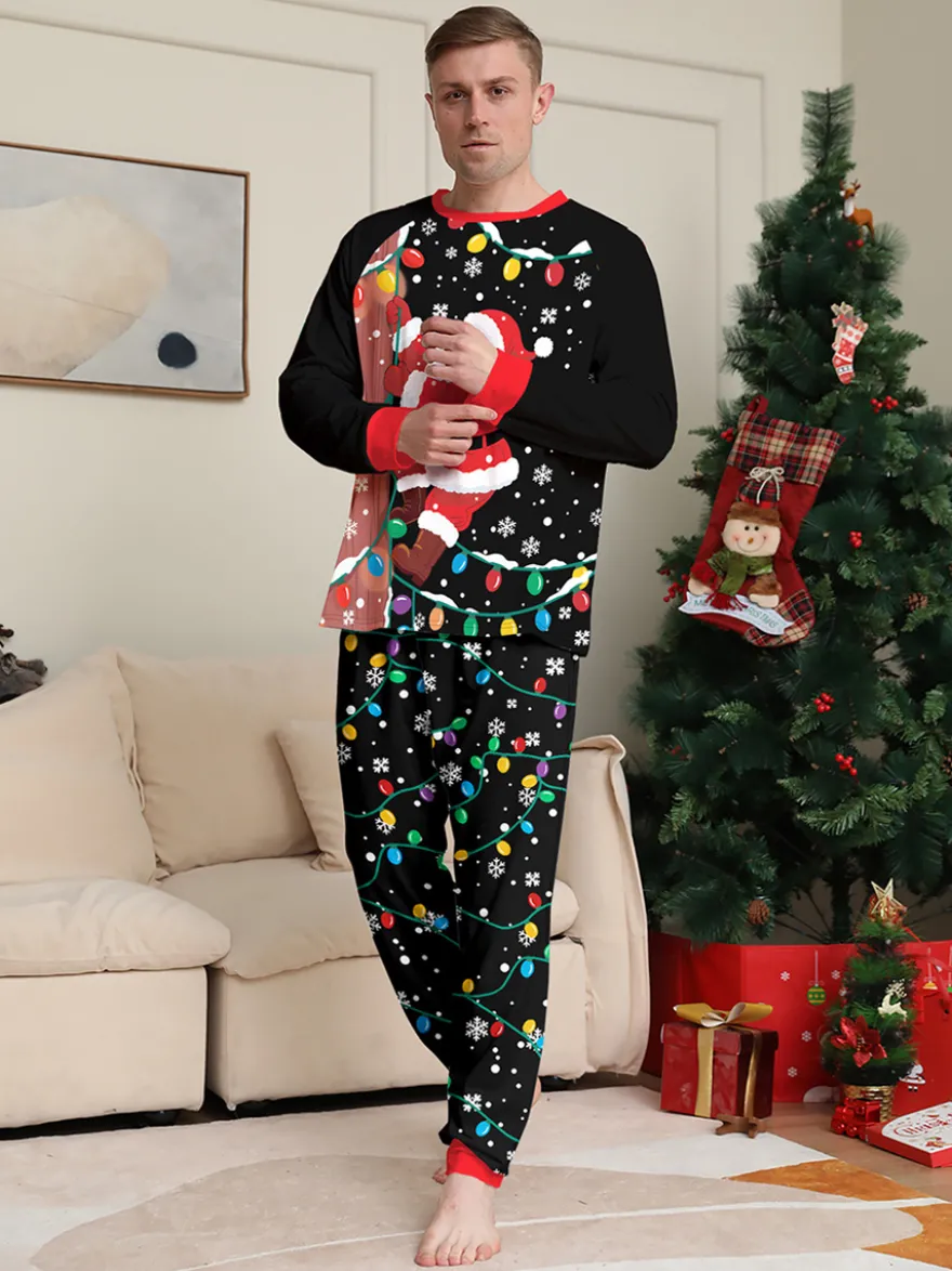 Pyjamas de Noël familiaux imprimés Père Noël noir et rouge et guirlandes lumineuses collection 2026