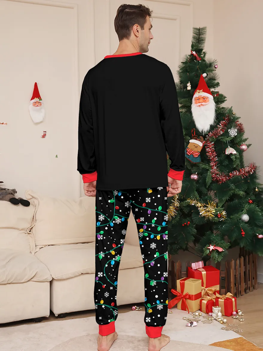 Pyjamas de Noël familiaux imprimés Père Noël noir et rouge et guirlandes lumineuses collection 2026