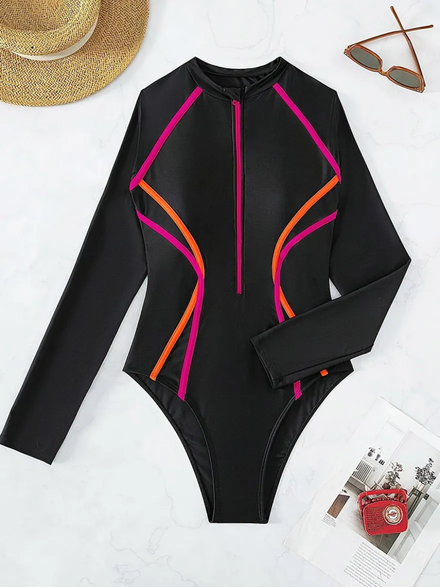 rashguard de surf une pièce à manches longues rayures contrastées dégradées et fermeture éclair sur le devant.