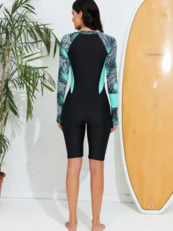 rashguard à manches longues raglan à imprimé palmiers et fermeture éclair sur le devant