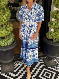 Robe chemise midi à volants bleu ciel à imprimé floral et manches bouffantes style décontracté.