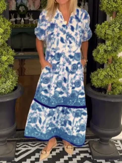 Robe chemise midi à volants bleu ciel à imprimé floral et manches bouffantes style décontracté.