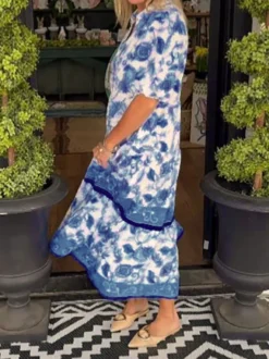 Robe chemise midi à volants bleu ciel à imprimé floral et manches bouffantes style décontracté.