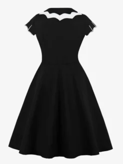 Robe cocktail vintage sans manches style swing années 1950