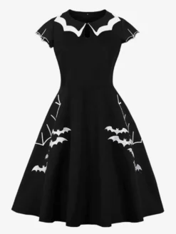 Robe cocktail vintage sans manches style swing années 1950